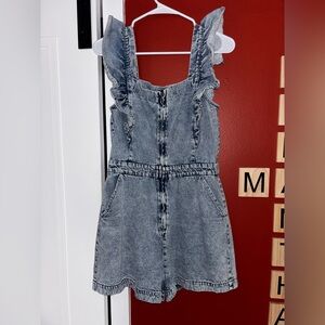 Blue Distressed Denim Jumpsuit with Vintage Aesthetic